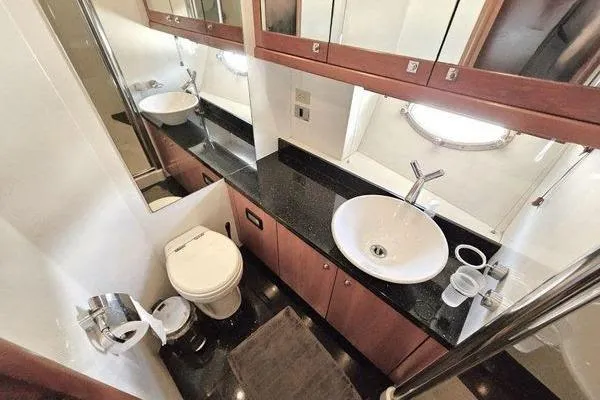 Slide: The Image of Luxurious bathroom in 2005 Sunseeker Manhattan 66 yacht with modern fixtures and elegant design. - 55