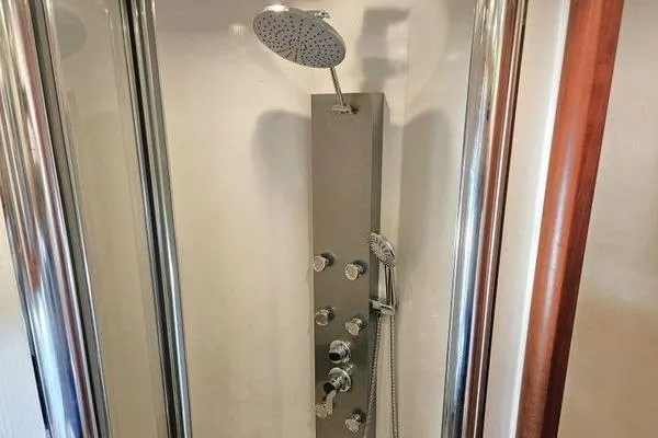 Slide: The Image of Luxurious shower in 2005 Sunseeker Manhattan 66 yacht, featuring modern fixtures and sleek design. - 56