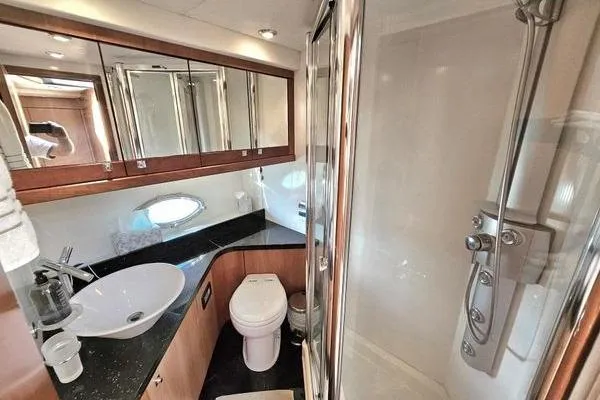 Slide: The Image of Luxurious bathroom in 2005 Sunseeker Manhattan 66 yacht with modern fixtures and shower. - 61