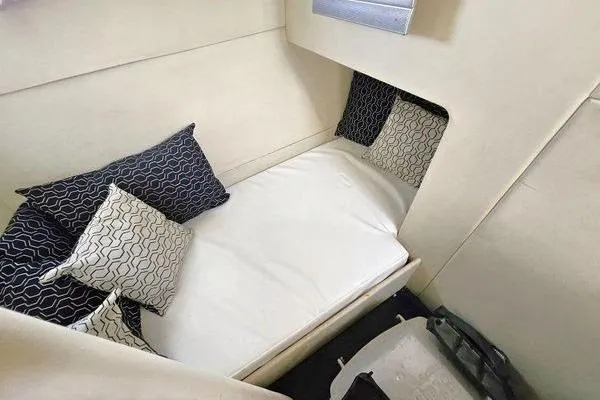 Slide: The Image of Cozy cabin interior of 2005 Sunseeker Manhattan 66 yacht with stylish pillows. - 64