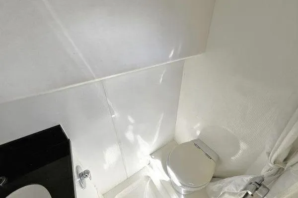 Slide: The Image of Bathroom interior of 2005 Sunseeker Manhattan 66 yacht, featuring modern fixtures and sleek design. - 65