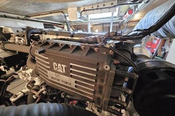 Slide: The Image of Engine room of 2005 Sunseeker Manhattan 66 yacht featuring CAT Marine Power engine. - 69