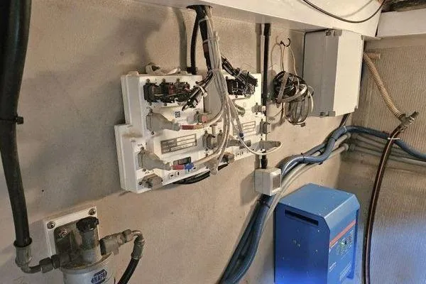 Slide: The Image of Electrical panel and wiring inside a 2005 Sunseeker Manhattan 66 yacht. - 73