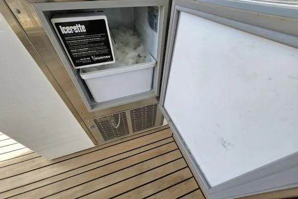 Slide: The Image of Ice maker on 2005 Sunseeker Manhattan 66 yacht with wooden deck flooring. - 8