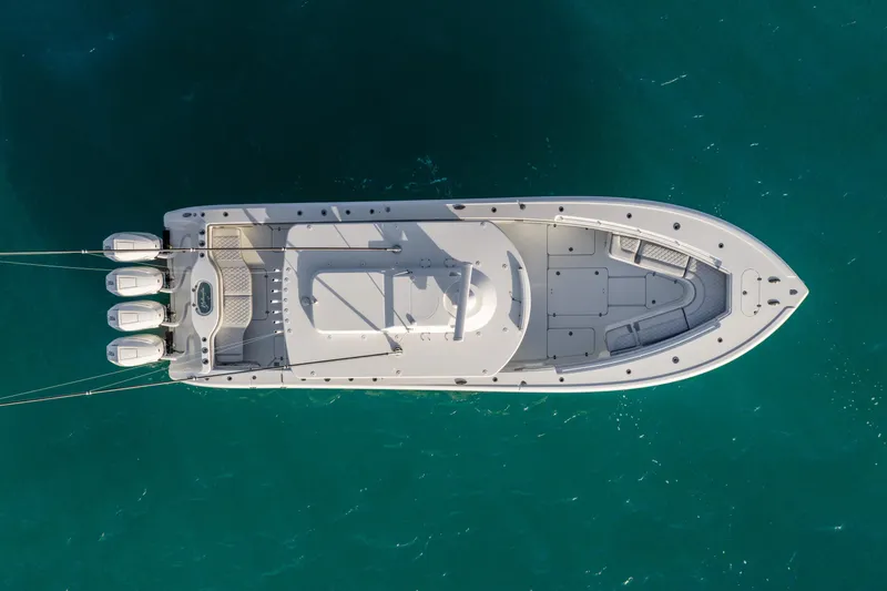 Slide: The Image of Aerial view of 2024 Yellowfin 39 Offshore boat on turquoise water. - 14