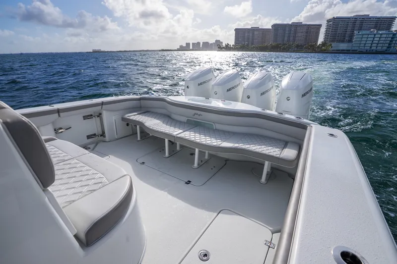 Slide: The Image of 2024 Yellowfin 39 Offshore boat with luxurious seating and powerful Mercury engines on open water. - 28