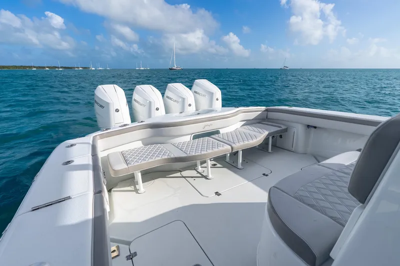 Slide: The Image of 2024 Yellowfin 39 Offshore boat with Mercury engines on open sea. - 29