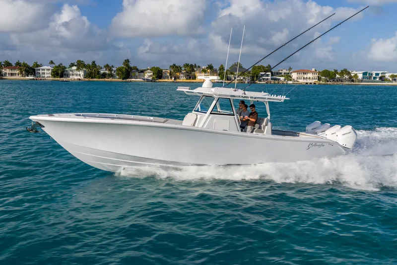 Slide: The Image of 2024 Yellowfin 39 Offshore boat cruising on blue ocean waters. - 3