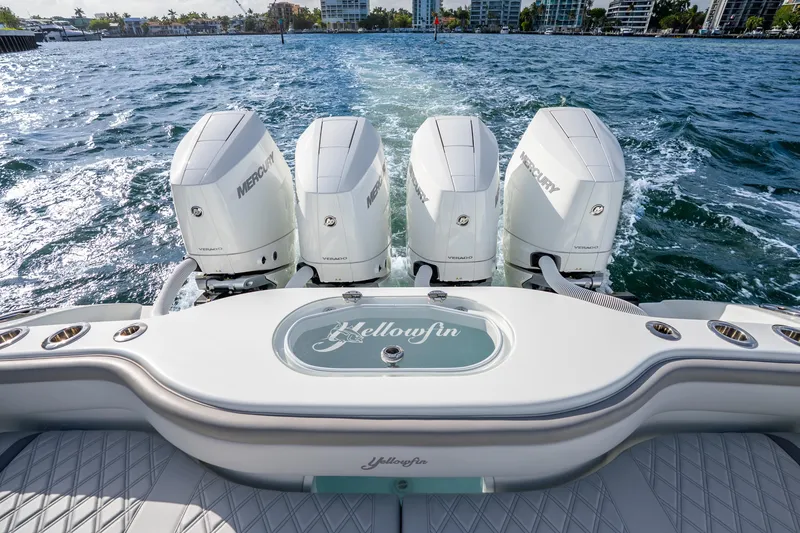 Slide: The Image of 2024 Yellowfin 39 Offshore boat with four Mercury Verado engines on open water. - 37