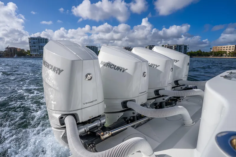 Slide: The Image of 2024 Yellowfin 39 Offshore boat with four Mercury Verado engines on the water. - 38