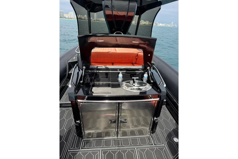 Slide: The Image of 2017 MV Marine 40 boat with sleek deck and onboard amenities. - 11