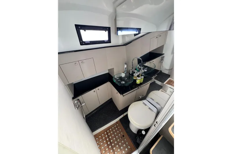 Slide: The Image of Luxurious bathroom interior of 2017 MV Marine 40 yacht with modern fixtures and cabinetry. - 25