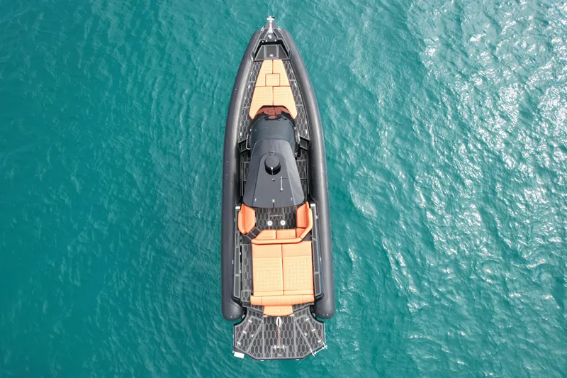 Slide: The Image of Top view of 2017 MV Marine 40 boat on clear blue water. - 8