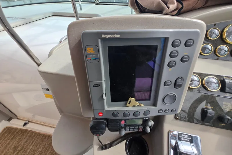Slide: The Image of Raymarine SL70C radar display on 2002 Cruisers Yachts 3372 Express dashboard. - 14