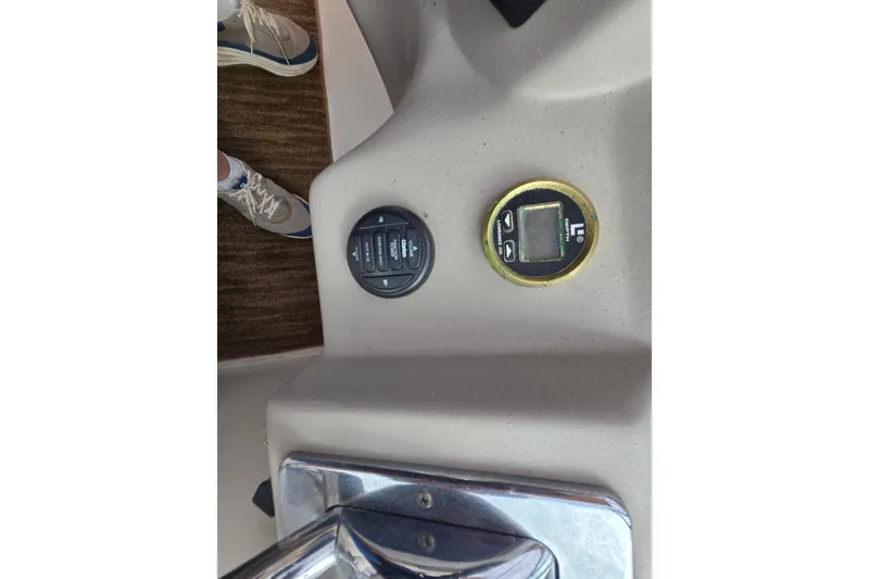 Slide: The Image of Control panel of a 2002 Cruisers Yachts 3372 Express boat. - 17