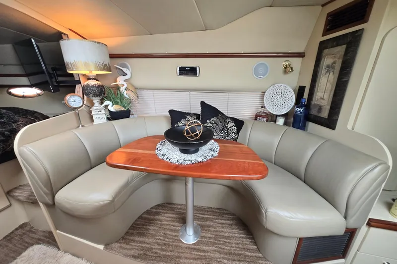 Slide: The Image of Luxurious interior of 2002 Cruisers Yachts 3372 Express with elegant seating and decor. - 19