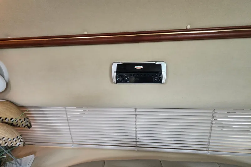 Slide: The Image of Interior of 2002 Cruisers Yachts 3372 Express with stereo system and blinds. - 29