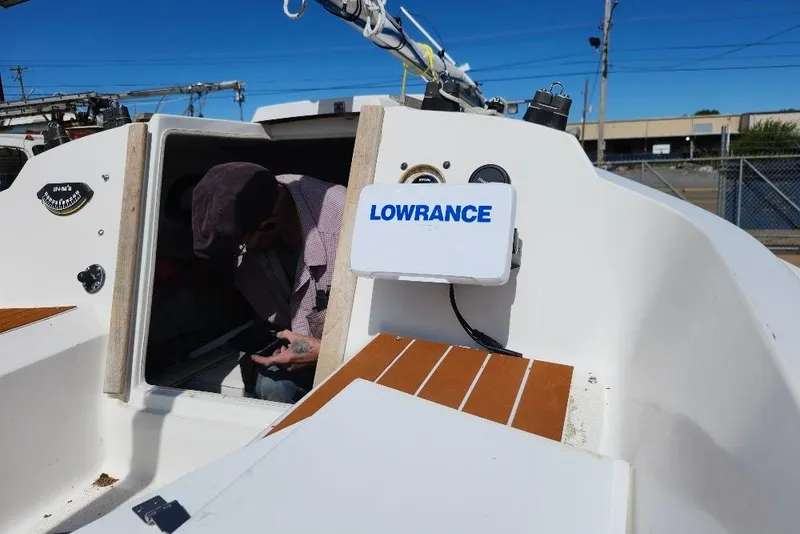 Slide: The Image of Sailboat cockpit with Lowrance device, Precision 165 model, 1996. - 11