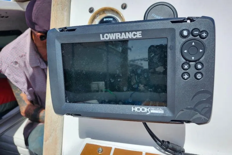 Slide: The Image of Lowrance HOOK Reveal fish finder on Precision 165 boat, 1996 model. - 12
