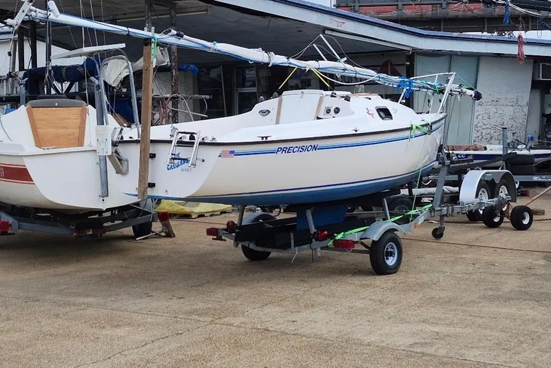 Slide: The Image of 1996 Precision 165 sailboat on trailer at marina, ready for transport. - 2