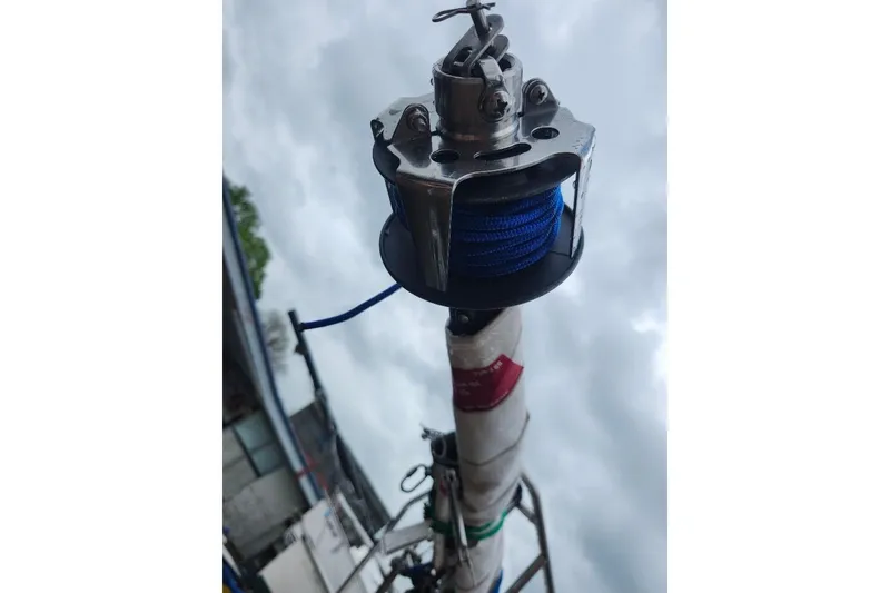 Slide: The Image of Sailboat mast with blue rope and metal fittings, Precision 165, 1996 model. - 6