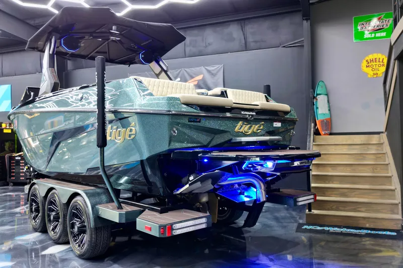 Slide: The Image of Luxurious interior of 2026 Tigé Z3 boat with beige seating and modern design. - 12