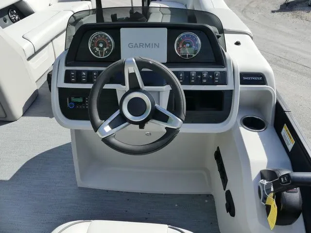 Slide: The Image of Godfrey Pontoons Sweetwater 2486 SFL 2026 helm with Garmin navigation. - 8