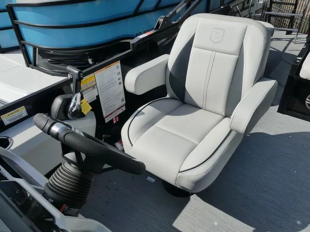 Slide: The Image of 2026 Godfrey Pontoons Sweetwater 2486 SFL helm with comfortable seat. - 9
