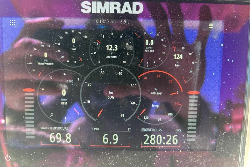 Slide: The Image of Simrad display on 2016 NauticStar 231 Coastal showing engine metrics and water temperature. - 10