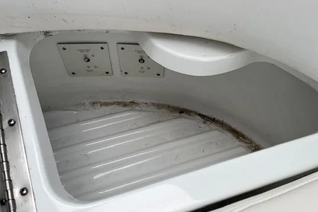 Slide: The Image of Storage compartment of a 2005 Formula 37 Performance Cruiser boat. - 16