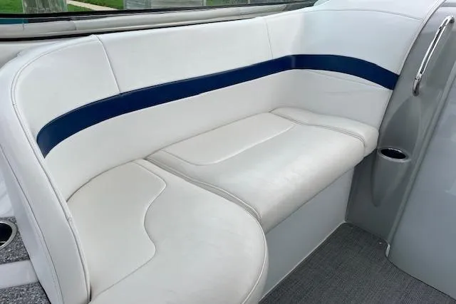 Slide: The Image of 2005 Formula 37 Performance Cruiser interior seating with white and blue upholstery. - 17