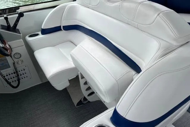 Slide: The Image of 2005 Formula 37 Performance Cruiser interior with white and blue seating. - 24