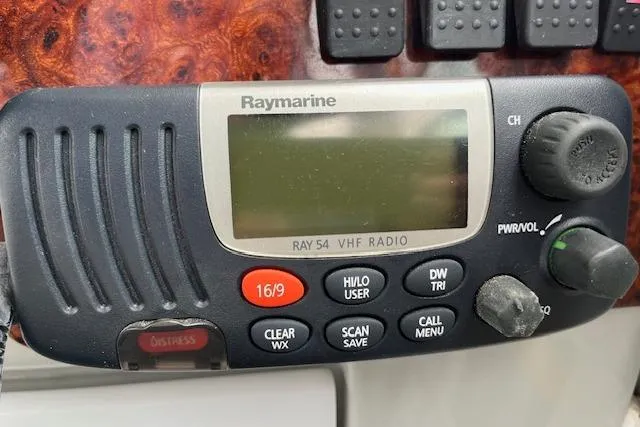 Slide: The Image of Raymarine Ray54 VHF radio on 2005 Formula 37 Performance Cruiser dashboard. - 30