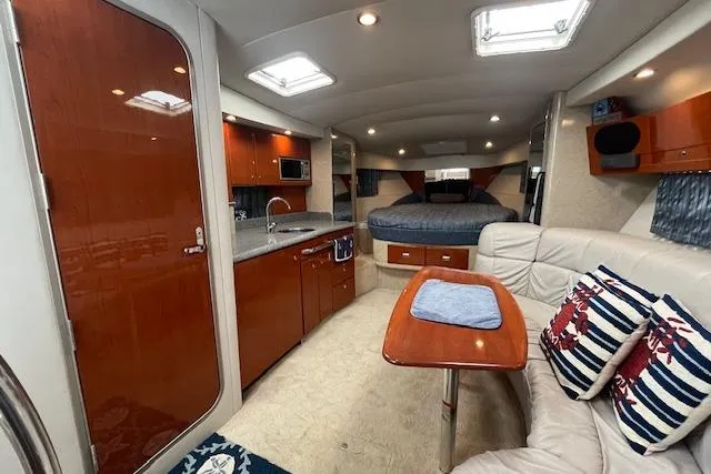 Slide: The Image of Luxurious interior of a 2005 Formula 37 Performance Cruiser with modern amenities. - 36