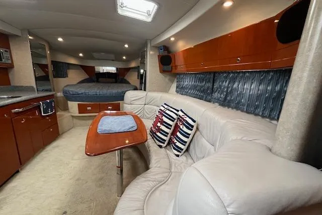 Slide: The Image of Luxurious interior of a 2005 Formula 37 Performance Cruiser with plush seating and elegant decor. - 37
