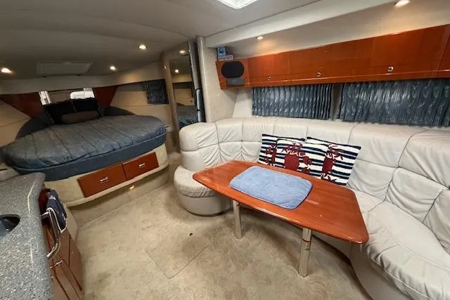 Slide: The Image of Interior of 2005 Formula 37 Performance Cruiser with cozy seating and sleeping area. - 42