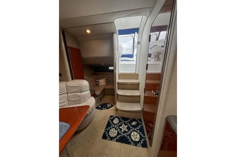 Slide: The Image of Interior of 2005 Formula 37 Performance Cruiser with stairs and seating area. - 43