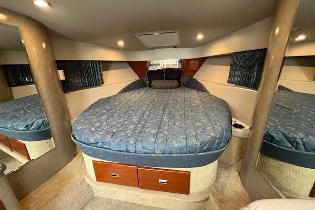 Slide: The Image of Luxurious interior of a 2005 Formula 37 Performance Cruiser with a cozy bed. - 44