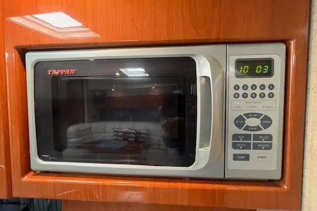 Slide: The Image of Built-in microwave in 2005 Formula 37 Performance Cruiser kitchen area. - 64