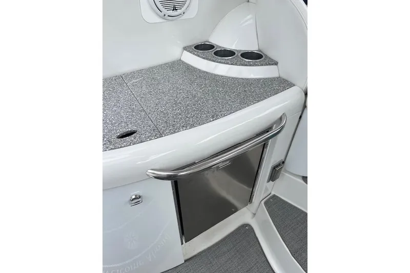 Slide: The Image of Interior of 2005 Formula 37 Performance Cruiser with sleek countertop and built-in cup holders. - 8