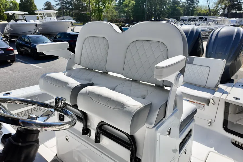 Slide: The Image of 2026 Sea Fox 282 Hybrid LT boat with luxurious seating and dual engines. - 12