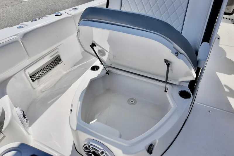 Slide: The Image of 2026 Sea Fox 282 Hybrid LT boat interior with open storage compartment and seating. - 14