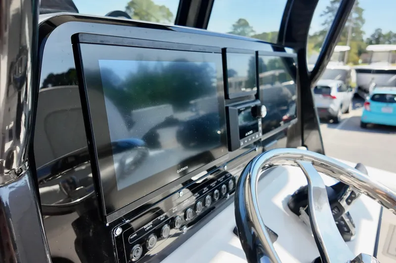 Slide: The Image of Steering console of 2026 Sea Fox 282 Hybrid LT with Garmin display. - 20