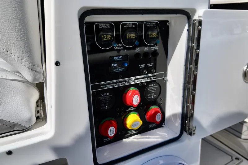 Slide: The Image of Electrical panel of 2026 Sea Fox 282 Hybrid LT boat, showing battery voltage and controls. - 25
