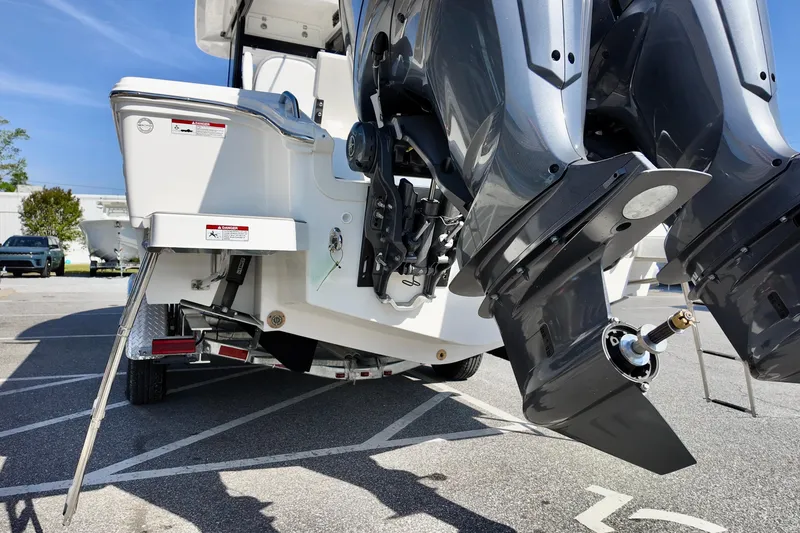 Slide: The Image of 2026 Sea Fox 282 Hybrid LT boat with dual outboard motors on a trailer. - 4