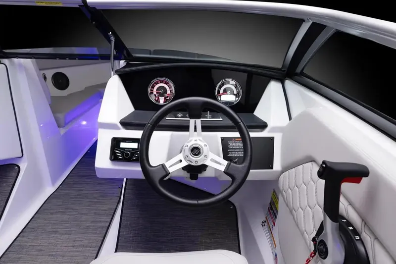 Slide: The Image of Manufacturer Provided Image: Interior cockpit of 2026 Four Winns H1 Freedom boat with steering wheel and controls. - 6