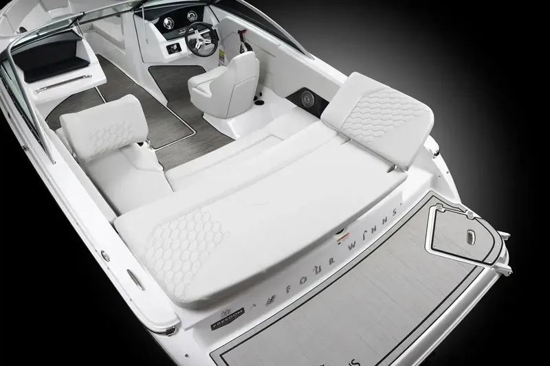 Slide: The Image of Manufacturer Provided Image: 2026 Four Winns H1 Freedom boat interior with white seating and modern dashboard. - 7