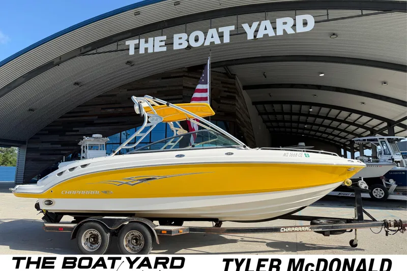 The Image of 2008 Chaparral 236 SSX boat in vibrant yellow at The Boat Yard dealership. - 1