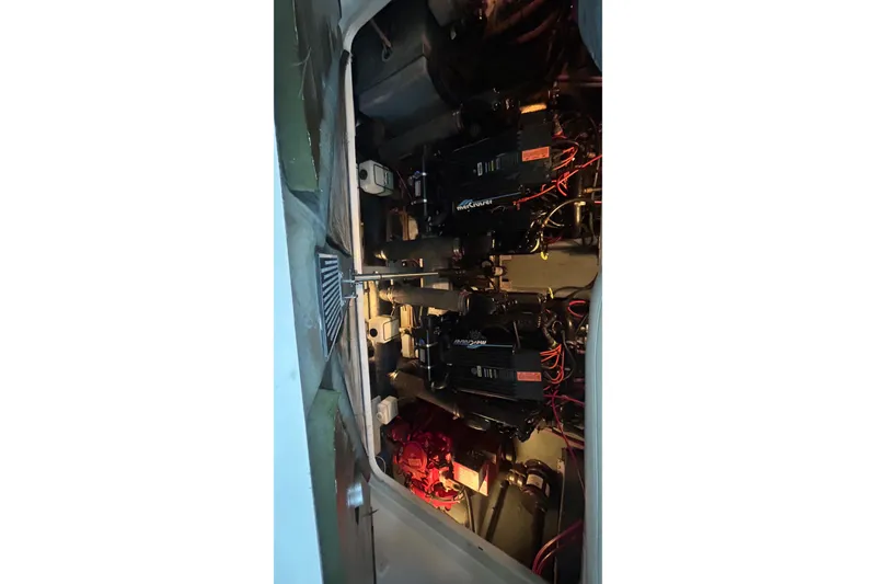 Slide: The Image of Engine compartment of a 1997 Sea Ray Sundancer 330 with visible MerCruiser engines. - 33