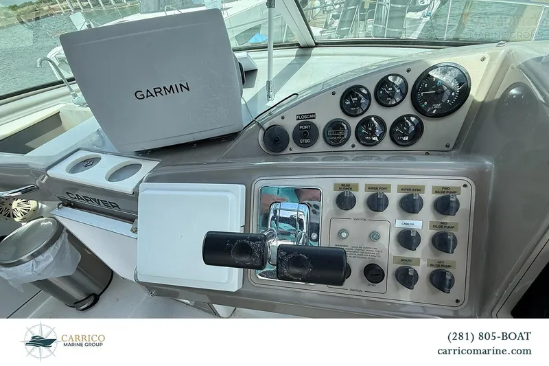 Slide: The Image of Control panel of a 2000 Carver 350 Mariner with Garmin navigation system. - 19